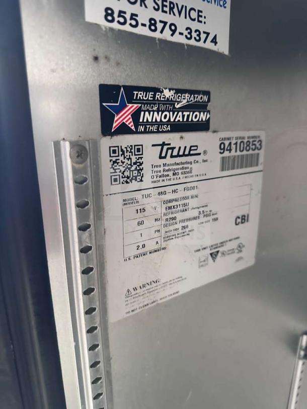 True TUC-48G-HC stainless steel undercounter refrigerator label showing model, voltage, and manufacturing details.