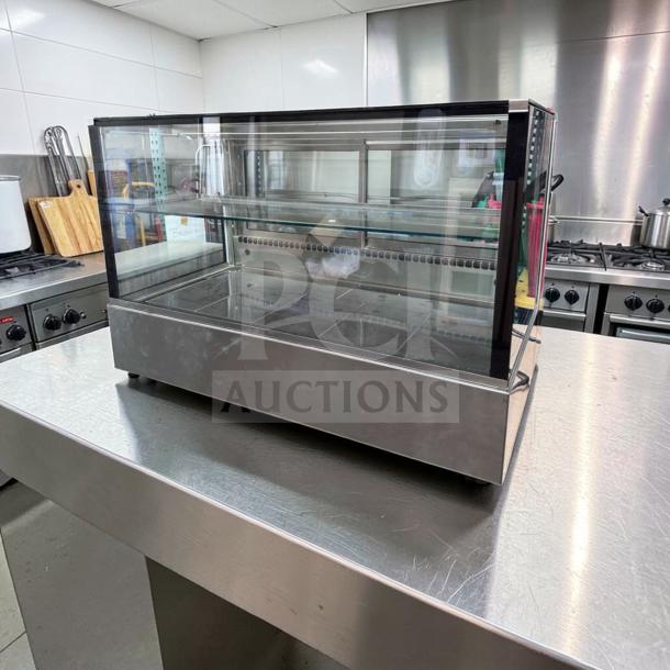 Immaculate RPI Industries VICD3-20-R-SQ-SC-CT refrigerated glass display case, 115V, commercial grade, fully operational.