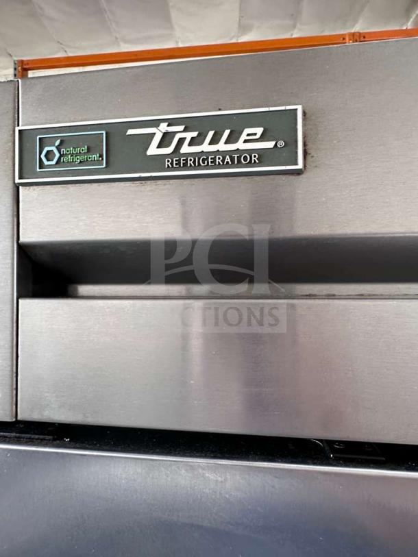 True T-35-HC commercial refrigerator, stainless steel, solid doors, excellent condition, 115V, natural refrigerant label.