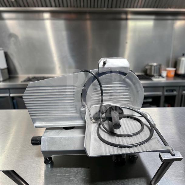 Globe C10 Chefmate manual meat slicer with 10" blade, belt driven, 1/4 HP, stainless steel, fully tested, top-tier condition.