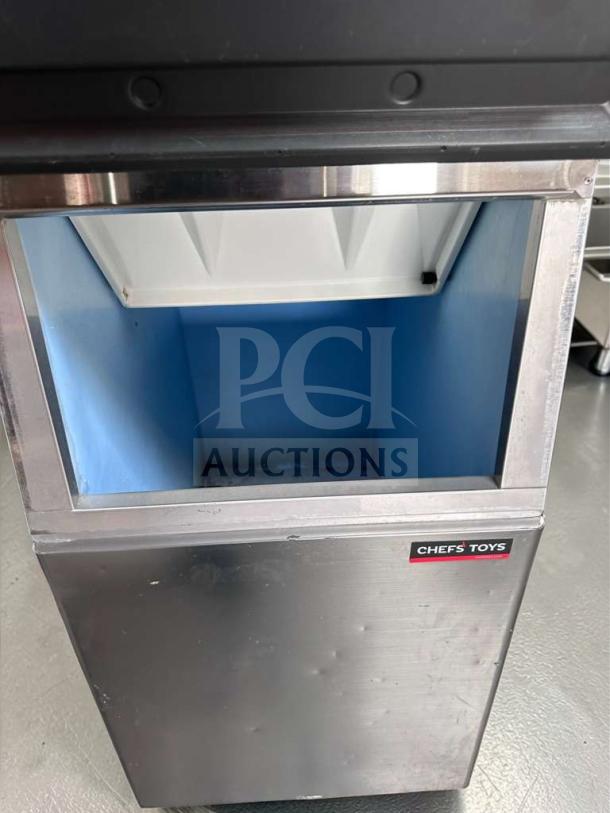 Hoshizaki KM-520MAJ ice machine with storage bin, 556 lb/day capacity, stainless steel, excellent condition, Chef's Toys label.