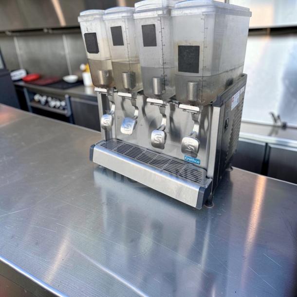 Crathco CS-4E-16-290 refrigerated drink dispenser, 4-bowl, superior condition, 120V, commercial use, fully tested.