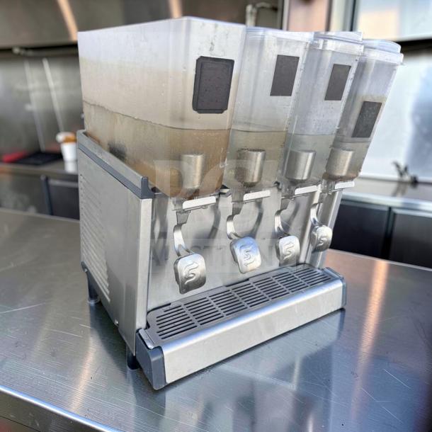 Crathco CS-4E-16-290 refrigerated drink dispenser, 4-bowl pre-mix system, superior condition, 120V, fully operational.