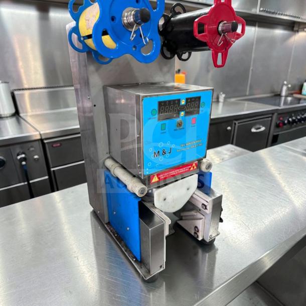 Outstanding condition ET-999SN automatic tabletop cup sealer by Y-Fang. Stainless steel, model ET999-M-SEAL-0791, fully tested.