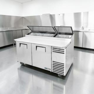 Outstanding condition True TPP-AT-67-HC pizza prep table refrigerator with marble top, two doors, 115V, tested and operational.