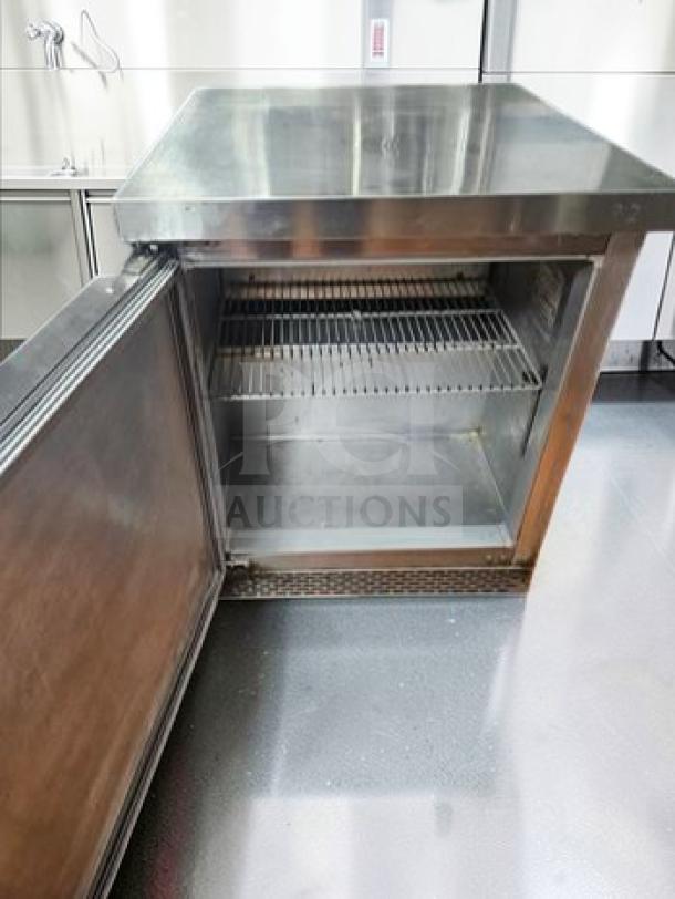 Continental Undercounter Refrigerator, stainless steel, 1 door, commercial use, exceptional condition, model CON-L-REF-0779.