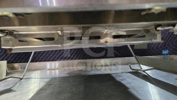 Stainless steel Nexgrill 2-burner portable propane gas tabletop grill, model 820-0033, shown in superior condition.