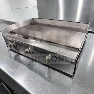 36" Commercial Gas Griddle in excellent condition, stainless steel, heavy-duty, fully operational, features three control knobs.