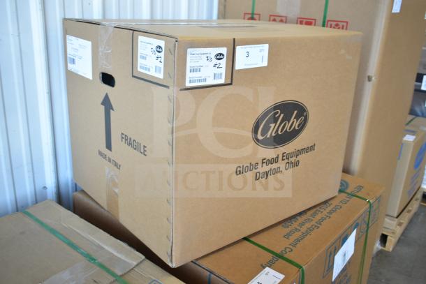 Globe G12 Commercial Slicer in box, new condition, includes 12" blade and sharpener, 115V, 1 Phase, marked "Fragile."