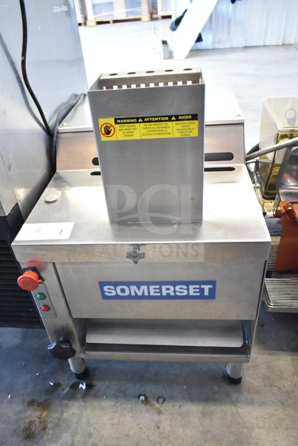 Somerset CDR-170 countertop dough moulder for 6-15" loaves. 110V, 1 phase, stainless steel, commercial use, safety warning visible.