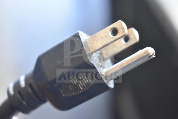 Close-up of the power cord plug for the Somerset CDR-170 Dough Moulder, 110V, 1 Phase.