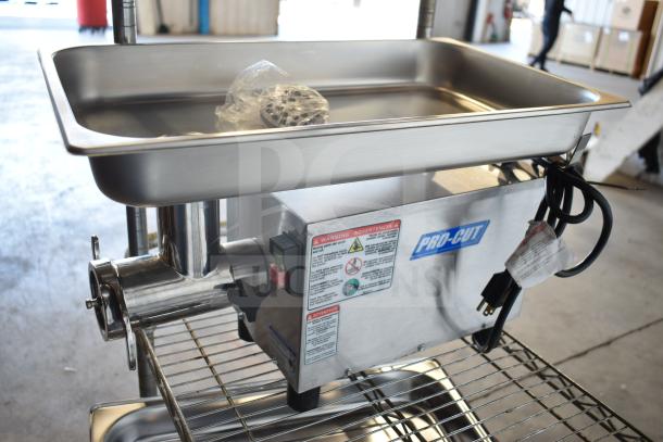 BRAND NEW Pro-Cut OKG12SS electric meat grinder, 115 volts, scratch and dent. Visible labels and power cord included.