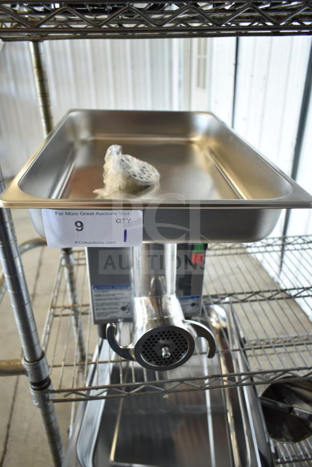 Brand new Pro-Cut OKG12SS electric meat grinder; 115 volts, 1 phase; minor scratches visible.