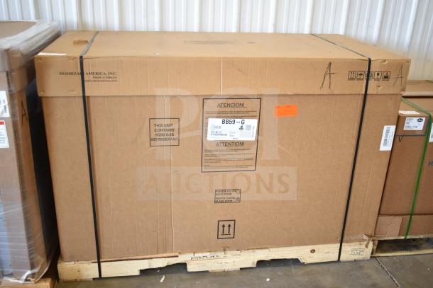 Brand new Hoshizaki BB59-G bar refrigerator with 2 glass doors packaged in box. Includes R290 gas refrigerant tag.
