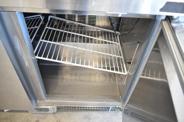 2023 Avantco 178ZWT48FHC 48" commercial worktop freezer, open double doors, wire shelves, front breathing, stainless steel.