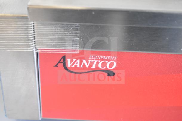 Brand new Avantco 177PG200 Panini Grill, grooved plates, 13 3/8" x 8 3/4" surface, 120V, with minor scratches.