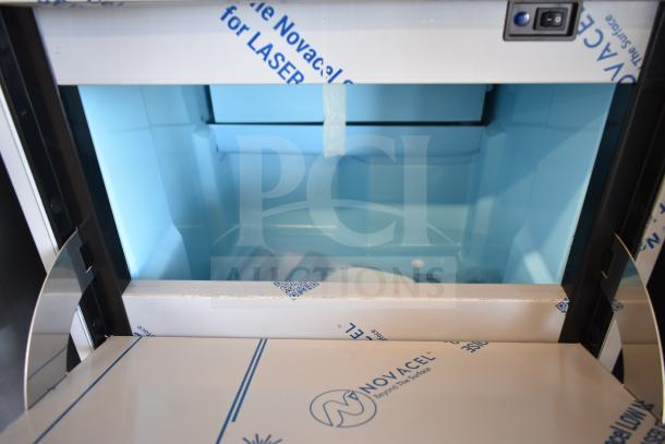 Brand new Avantco 194EUCF130A undercounter ice machine, full cube, 44 lb bin, 134 lb capacity, visible Novacel protective film.