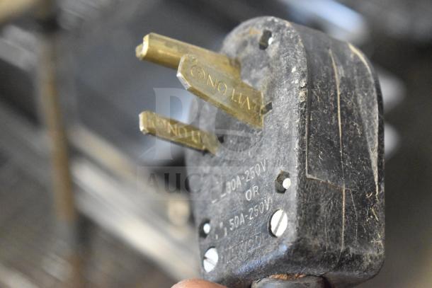 Three-prong plug labeled 30A-250V or 50A-250V. Suitable for high-voltage appliances like commercial espresso machines.