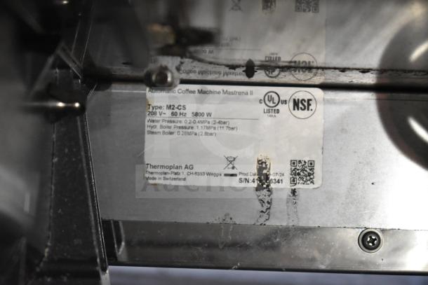 2024 Thermoplan Mastrena M2-CS espresso machine label, detailing type, voltage, UL and NSF certifications. Made in Switzerland.