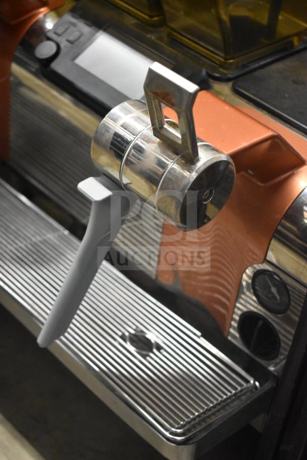 Stainless steel Thermoplan Mastrena M2-CS espresso machine, featuring LCD display, hoppers, steam wand.