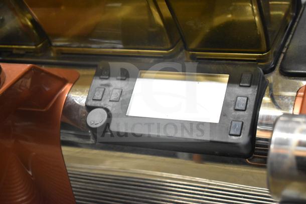 2019 Thermoplan Mastrena M2-CS espresso machine with LCD display, hoppers, and steam wand, stainless steel body, 208V, 1 phase.