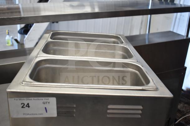 Avantco 177W50 countertop food warmer, four compartments, stainless steel, 120 volts, in used condition with auction label.