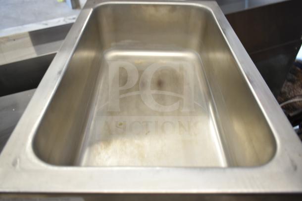 Avantco 177W50 countertop food warmer, stainless steel interior, showing light wear, 120 volts, 1 phase.