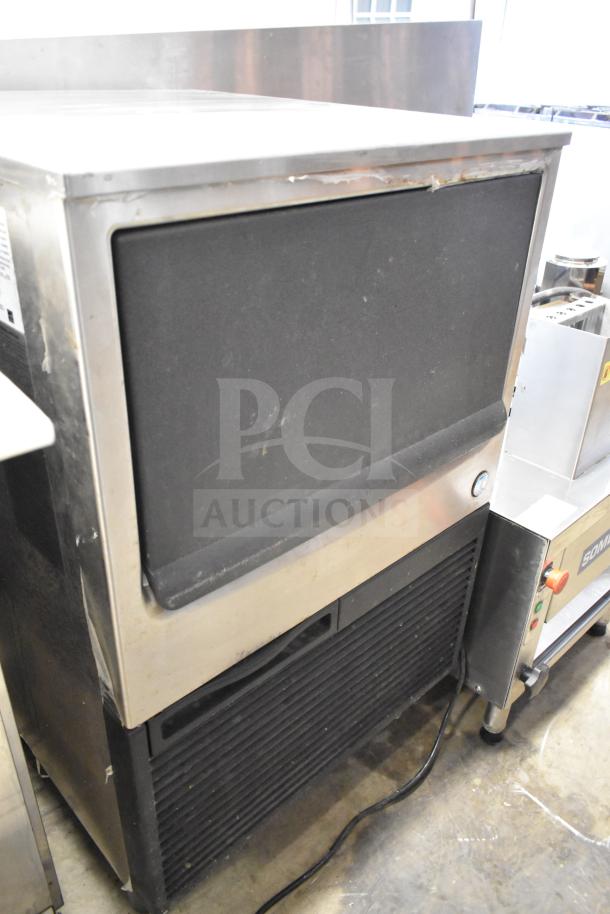 Hoshizaki KM-151BAH commercial undercounter ice machine, crescent cube, stainless finish, visible wear, 115V, 1 phase.