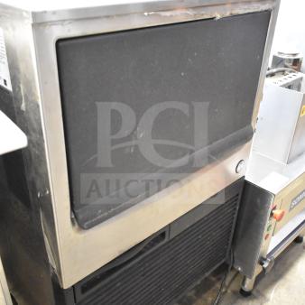 Hoshizaki KM-151BAH commercial undercounter ice machine, crescent cube, stainless finish, visible wear, 115V, 1 phase.