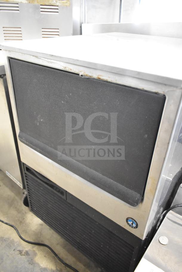 Hoshizaki KM-151BAH undercounter ice machine, crescent cube type, 115V, used condition, visible rust on edges.