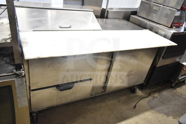 Beverage Air SPED60HC-08C-2 sandwich prep table with 1 door, 2 drawers, cutting top, and commercial casters. Used condition.