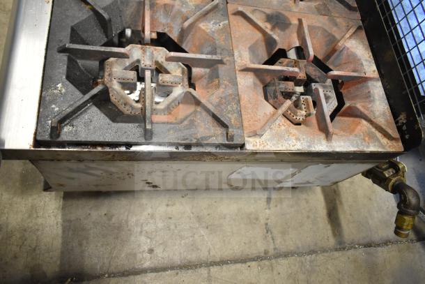 Cooking Performance Group CPG commercial 6 burner range, gas-powered, rusted, and worn condition, suitable for parts or repair.