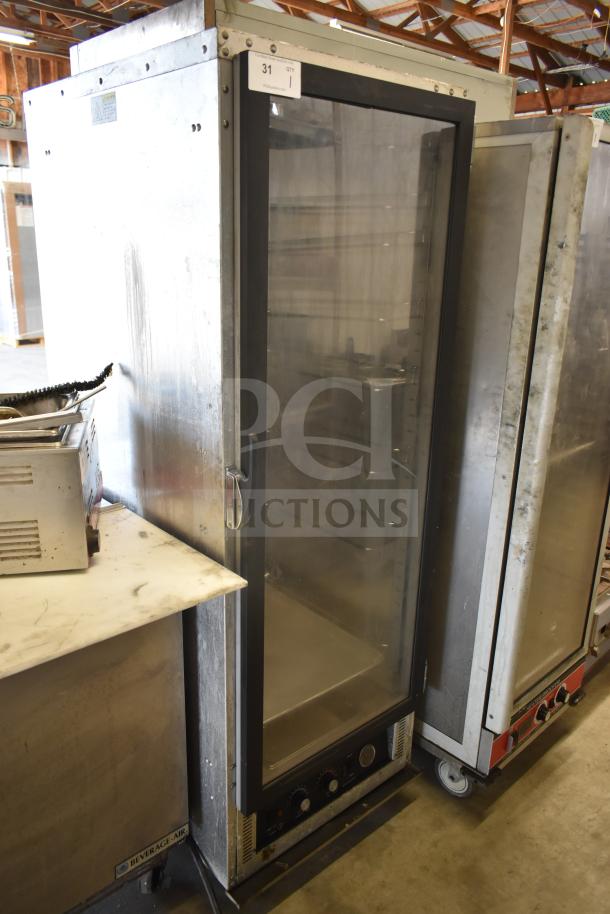 Cres Cor 121PHUA11D commercial heated holding cabinet on casters, glass door, used condition, 120V, 1 phase.