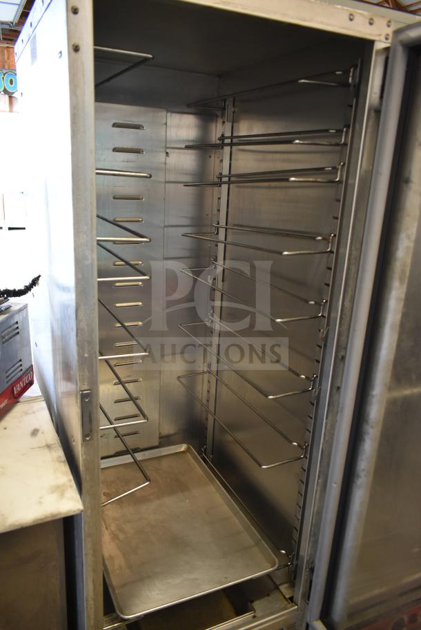 Cres Cor 121PHUA11D heated holding cabinet on casters, stainless steel interior, adjustable racks, 120 volts, 1 phase.