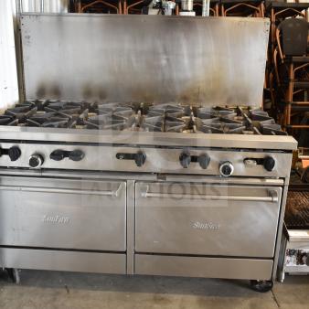 Garland SunFire X60-10RR 10-burner range with 2 ovens, backsplash, commercial casters. Propane gas. Used condition.
