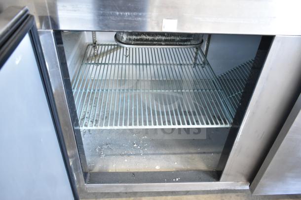 2016 Leader LM72 S/C Commercial Sandwich Prep Table, Mega Top, 2-Tier Shelf, 115V, clean interior shelving.