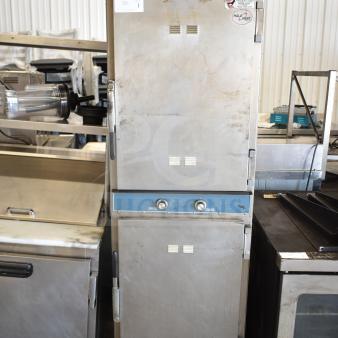Alto Shaam 1000-TH/I commercial cook and hold oven with classic controls, on casters, 208-240V, 1 phase. Signs of use visible.