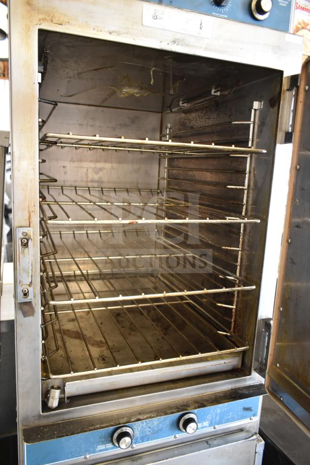 Alto Shaam 1000-TH/I commercial full-height cook and hold oven with classic controls; visible wear; on casters; 208-240V, 1 phase.