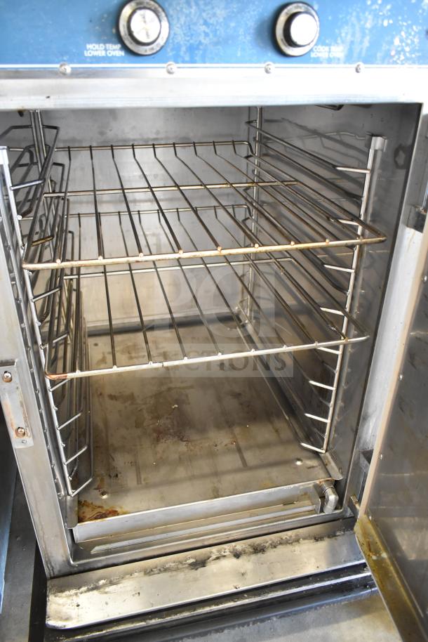 Alto Shaam 1000-TH/I full height cook and hold oven with classic controls, visible internal racks, on commercial casters.