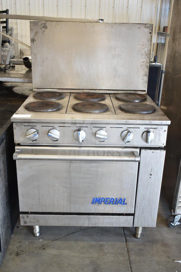 Imperial IR-6-E commercial 6 burner electric hot plate range with oven, and back splash; model IR-6-E, 208V, 3 phase.