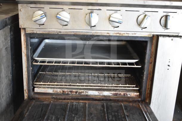 Imperial IR-6-E commercial electric 6 burner hot plate with oven, 208V, 3 phase, with back splash, used condition.
