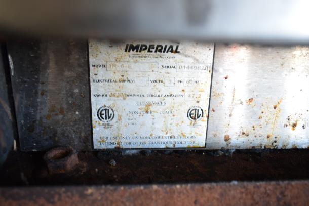 Imperial IR-6-E commercial electric 6 burner range with oven, 208V, 3 phase. Worn label, ETL certified for commercial use.