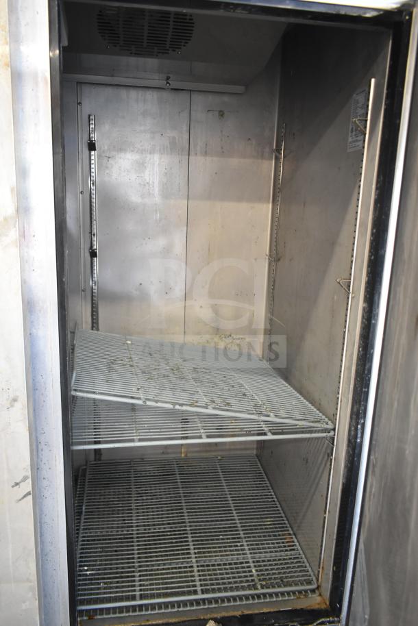 Dukers D55R Commercial 2 Door Cooler, 115V, 1 Phase. Used condition, includes wire shelves and interior fan.