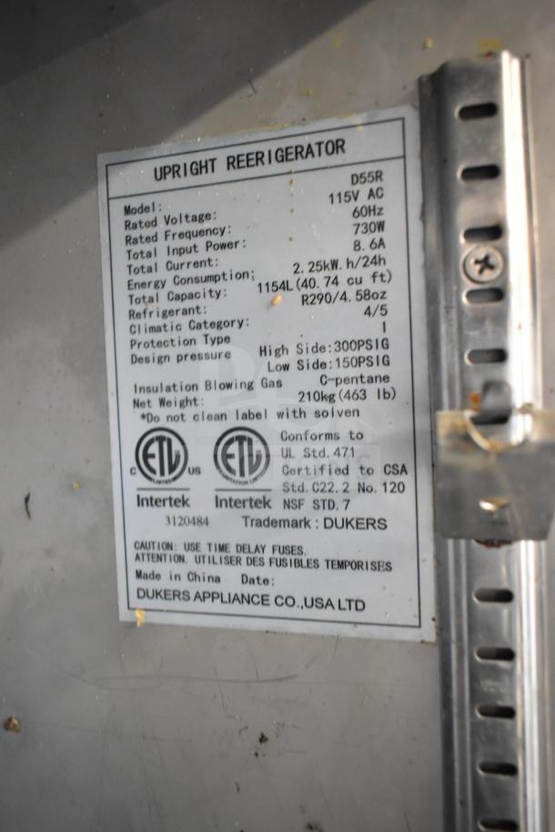 Dukers D55R Commercial 2 Door Reach-In Cooler tag, showing 115V, 730W, 1154L capacity, ETL certified.