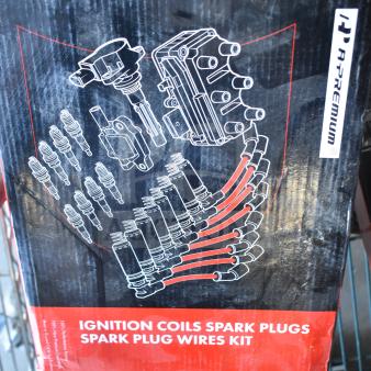 A-Premium ignition coils, spark plugs, and wire kit in branded box. New scratch and dent condition.