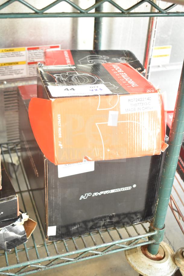 Brand new scratch and dent items: electronic throttle body, height level sensor, ignition coils spark plug, in original packaging.