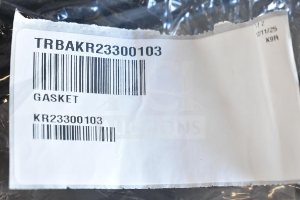 Lot of cables and gaskets with tag reading "TRBAKR23300103." Contains barcodes, text "GASKET KR23300103."