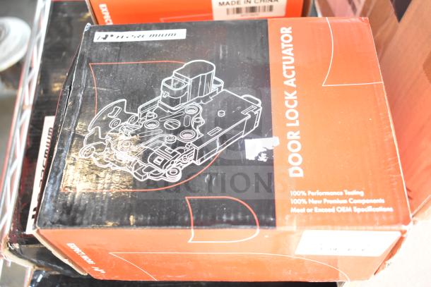 Three brand new scratch and dent items: door lock actuator, brake pad, ignition coils spark plugs kit. Box shows actuator diagram.