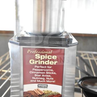 Stainless steel Waring Commercial spice grinder, 115 volts, 1 phase. Suitable for peppercorns, cinnamon, nuts, and more.