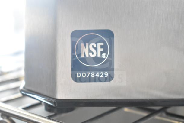 Spice grinder, 115 volts, 1 phase, NSF certified, model D078429, stainless steel, excellent condition.
